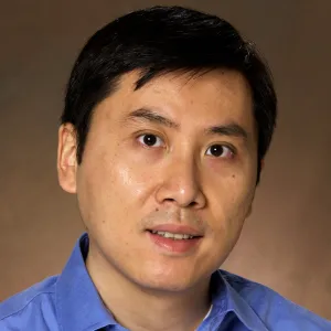 Pinjing Zhao smiling confidently at the camera