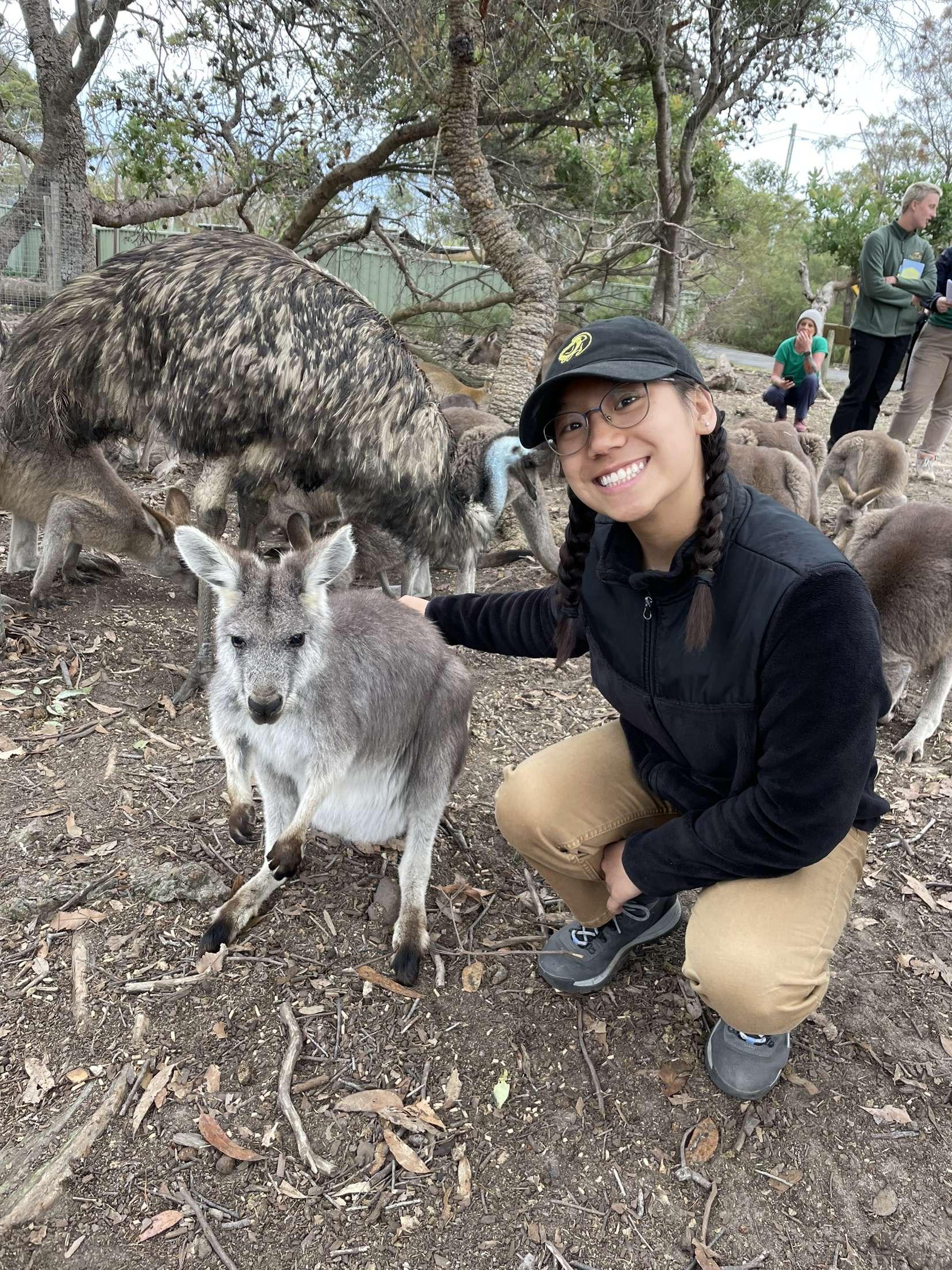 Photo of Anna Rustad and a kangaroo