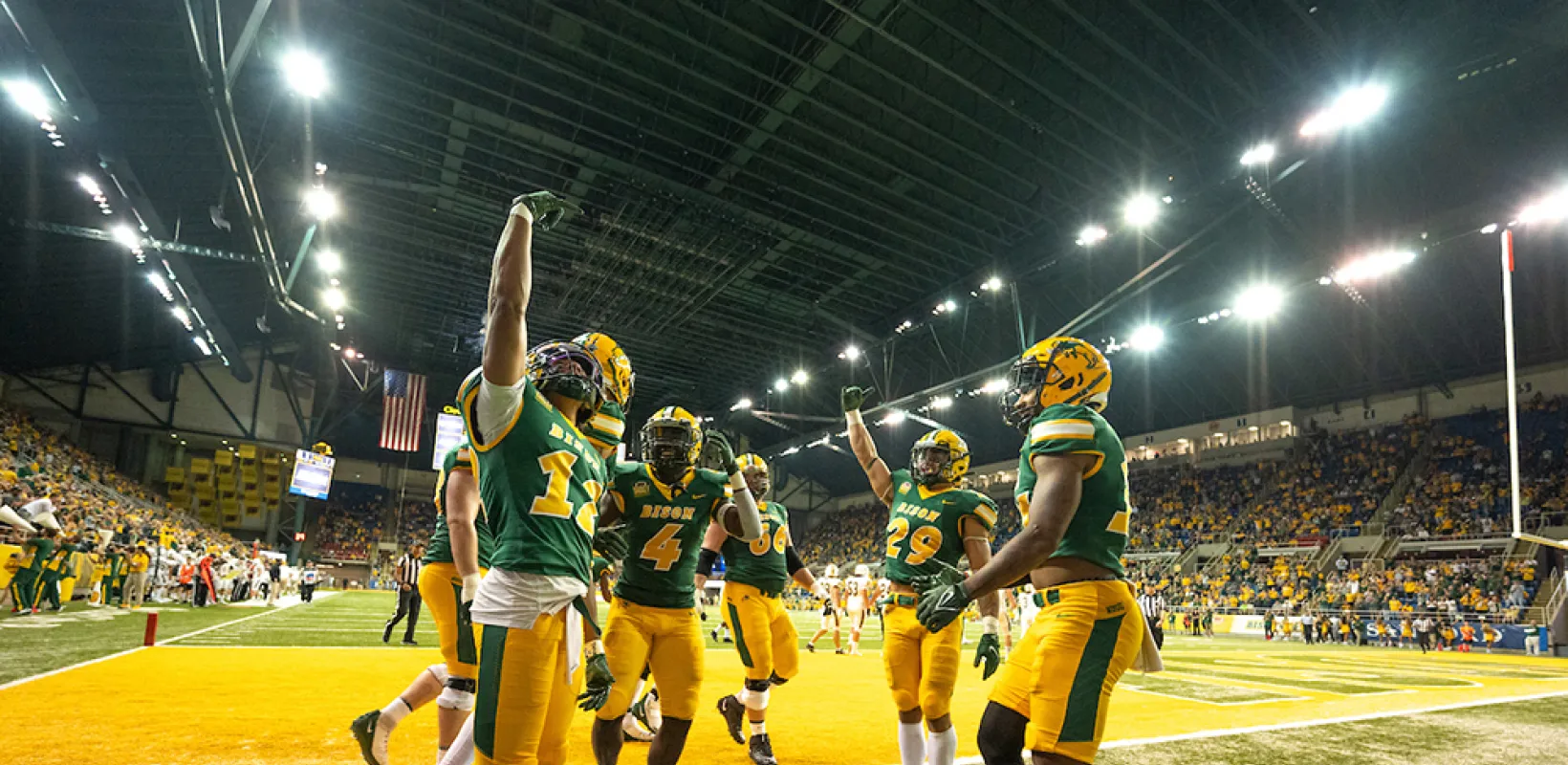 NDSU football players celebrating during a game