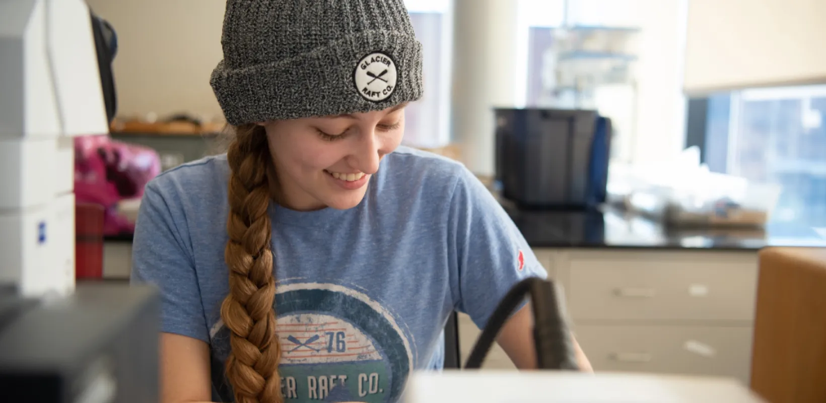 a paleontology student working in a lab