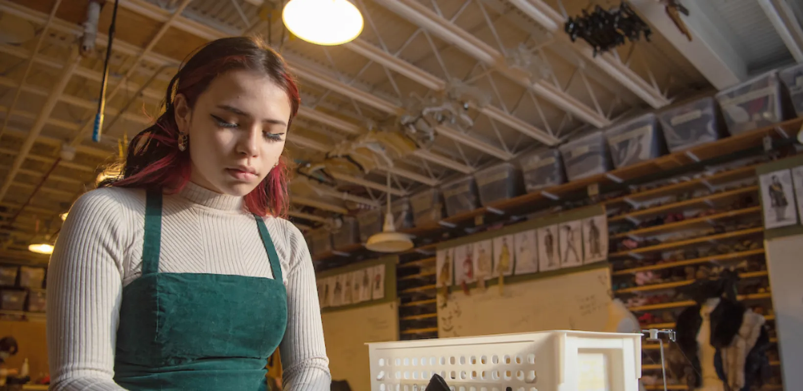 NDSU Anjolie Lo working on a costume