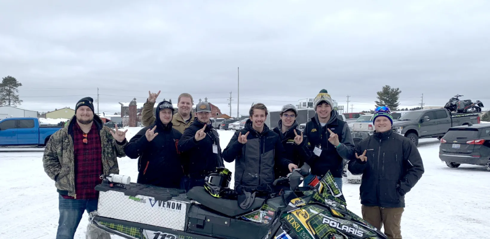 NDSU engineering students with their clean snowmobile