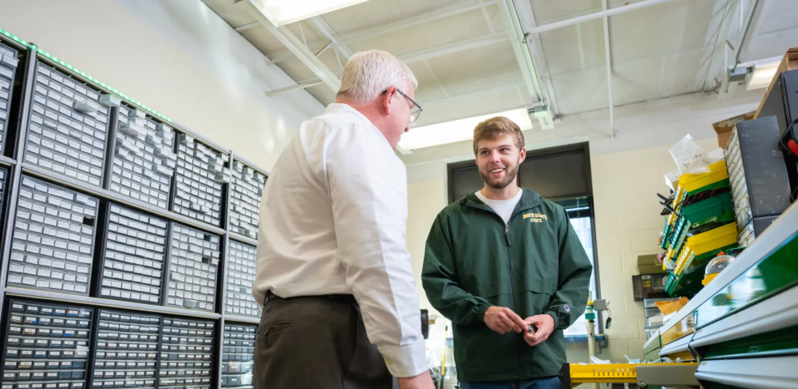 professor and student working on an engineering project