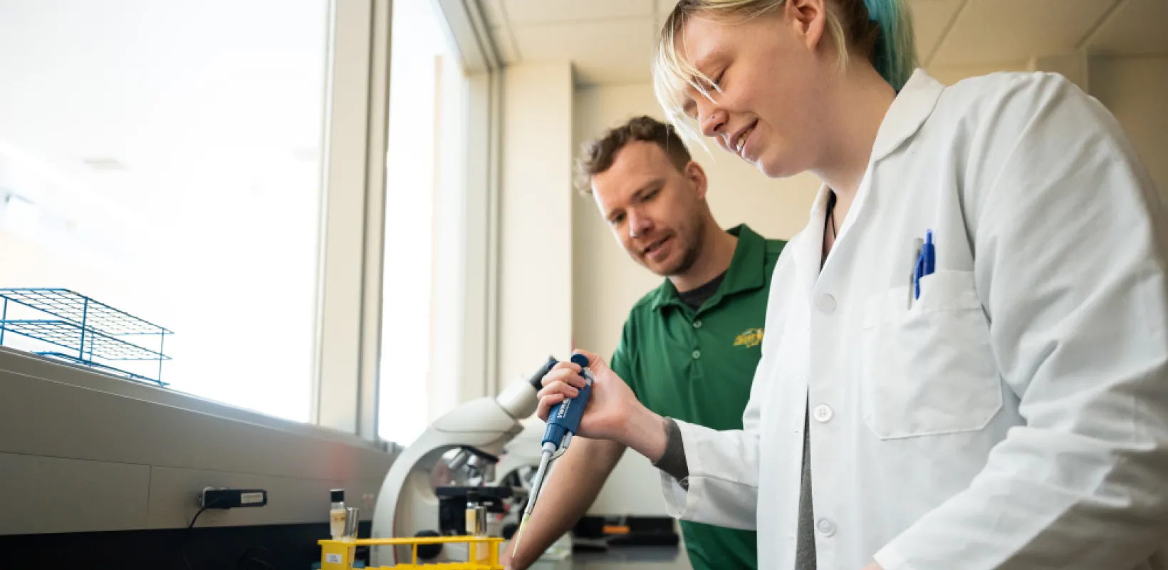 students working with samples in a lab