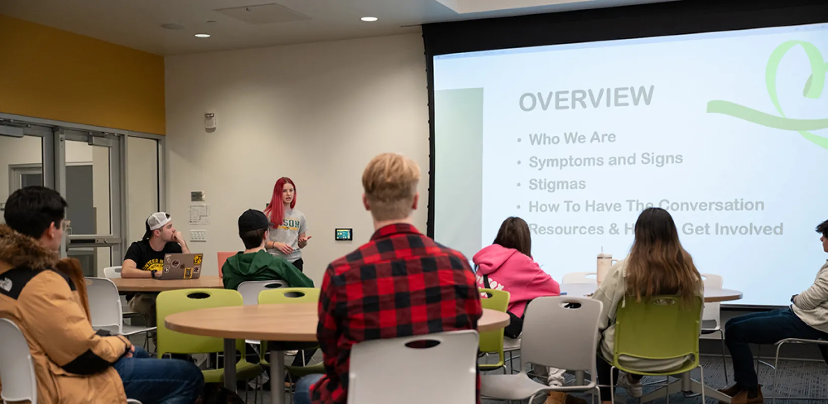 students watching a presentation in a classroom