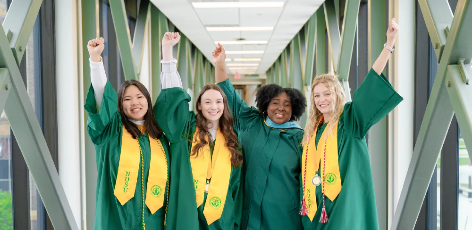 Four commencement speaker candidates smile