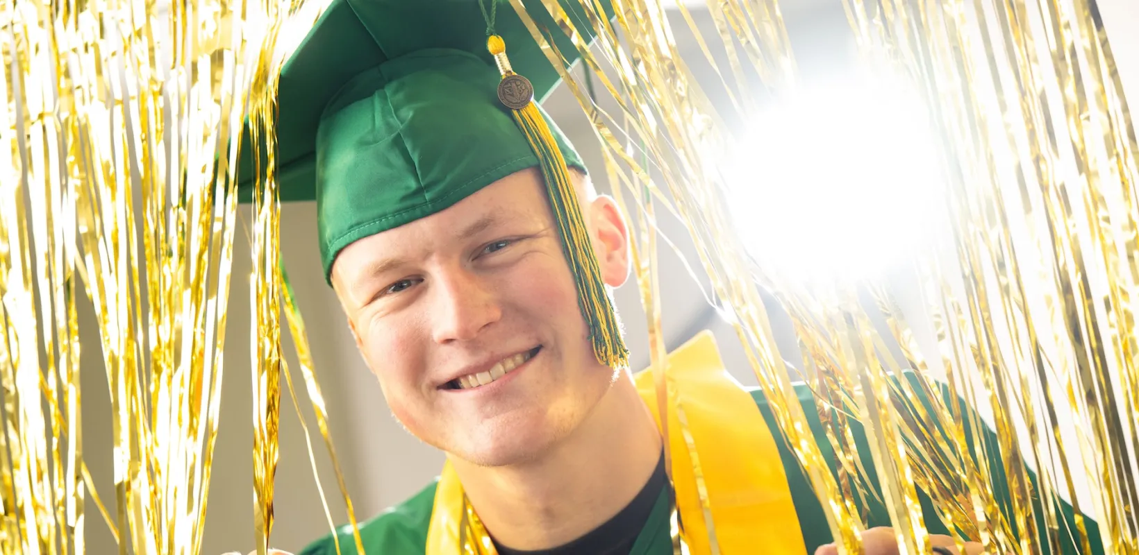ndsu graduate smiling for the camera