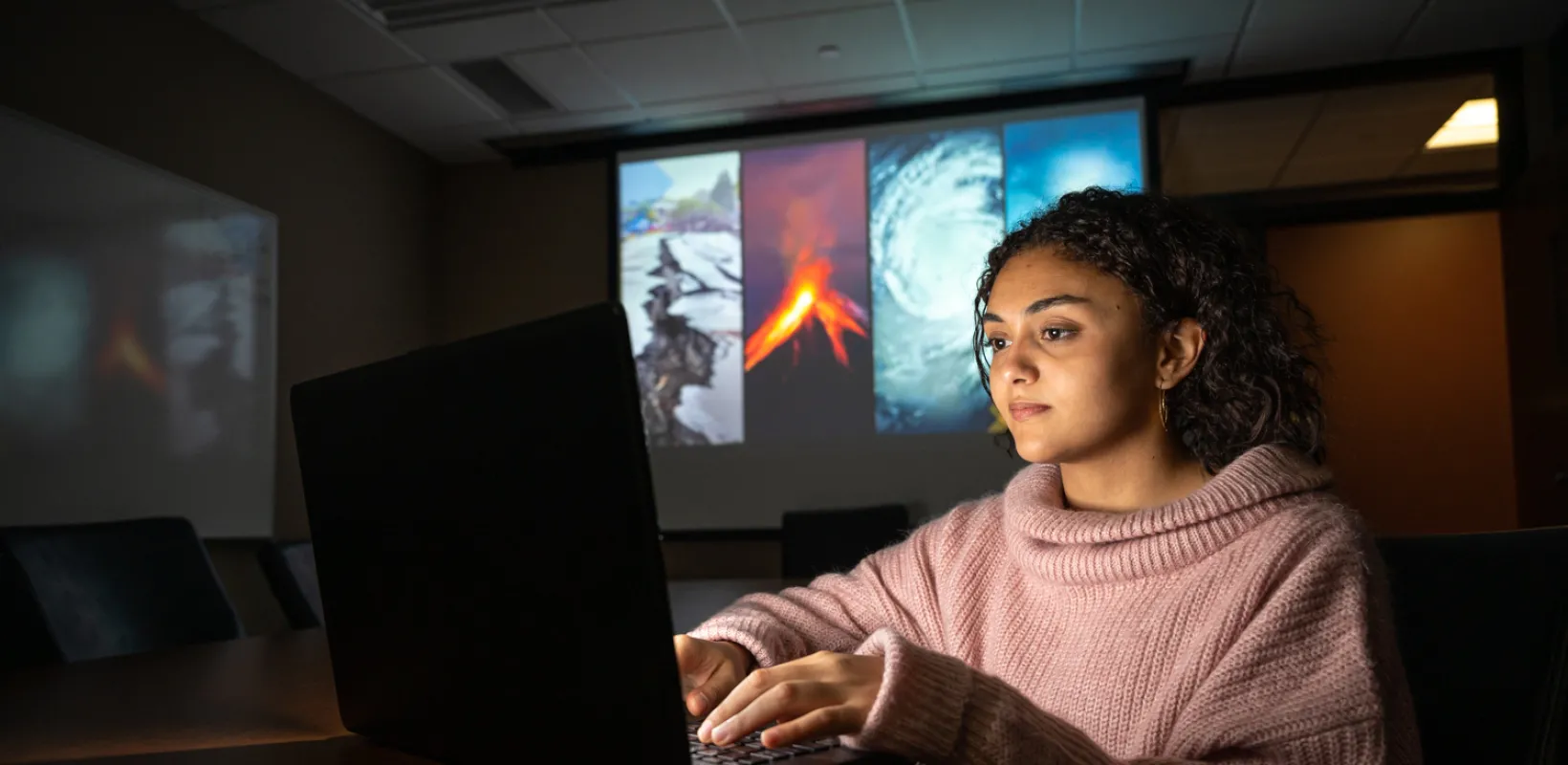 student working on a laptop