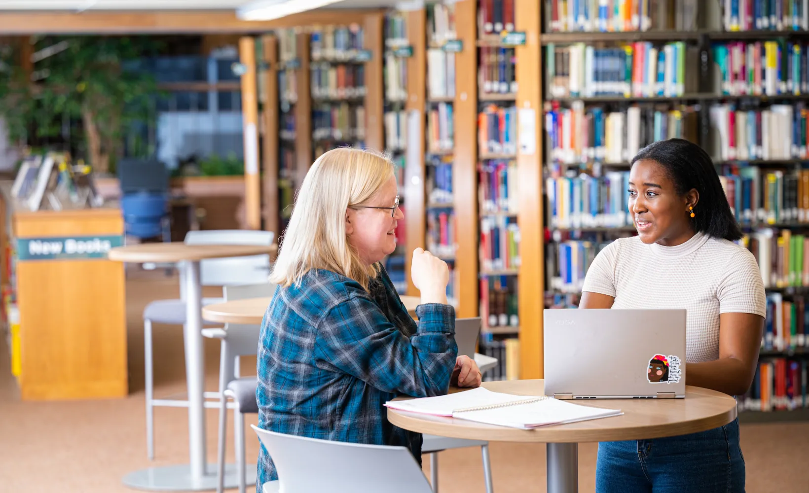 writing students working together in the library