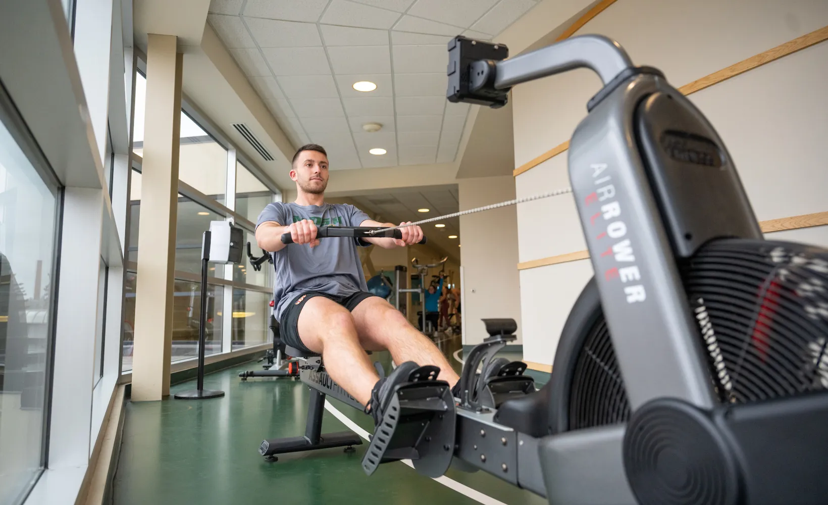 student exercising on a rowing machine at the NDSU Wellness Center
