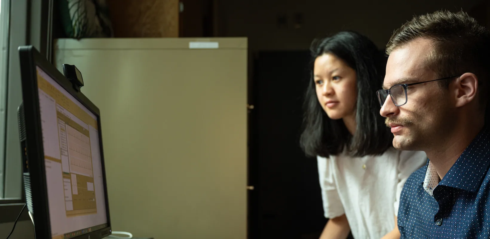 students looking at results from a test on a computer screen