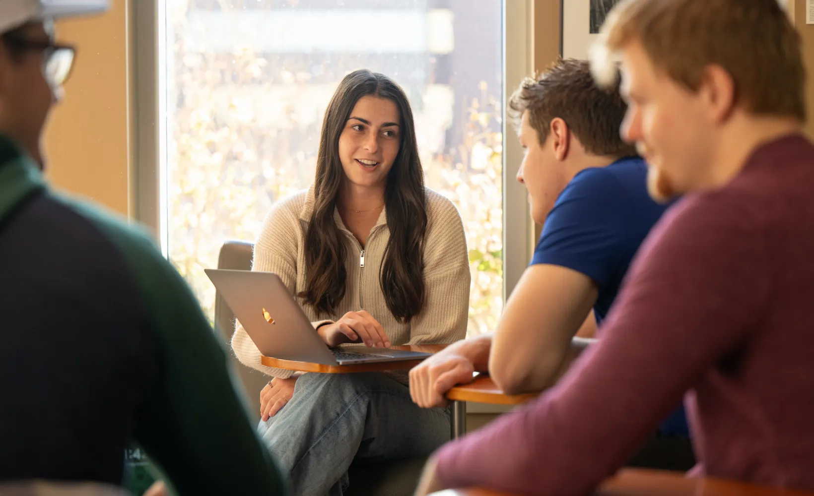 Business students discussing their classwork