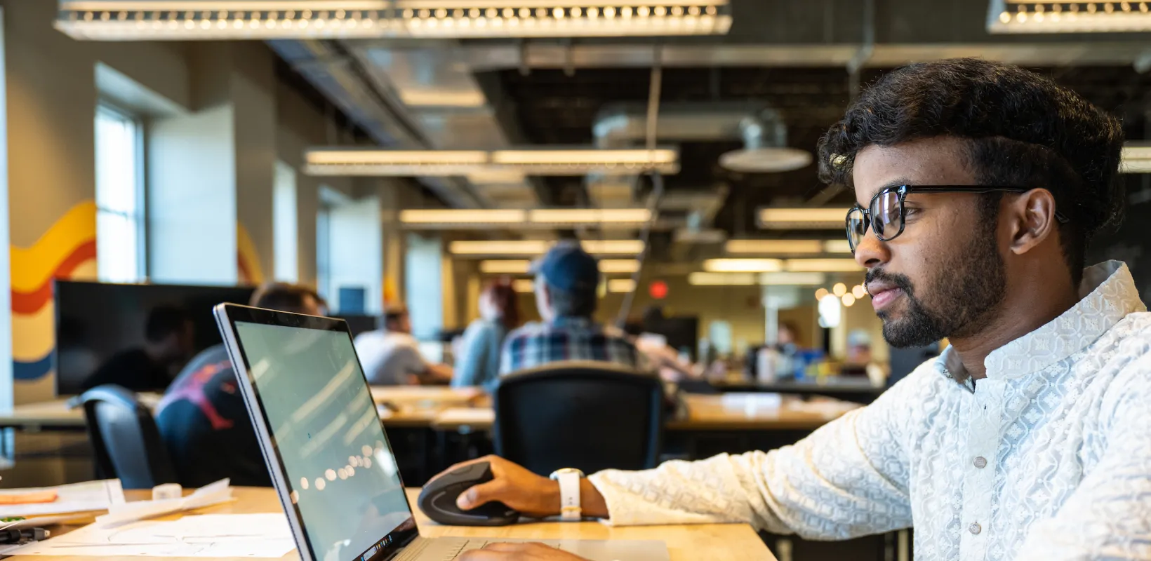 student working on a laptop