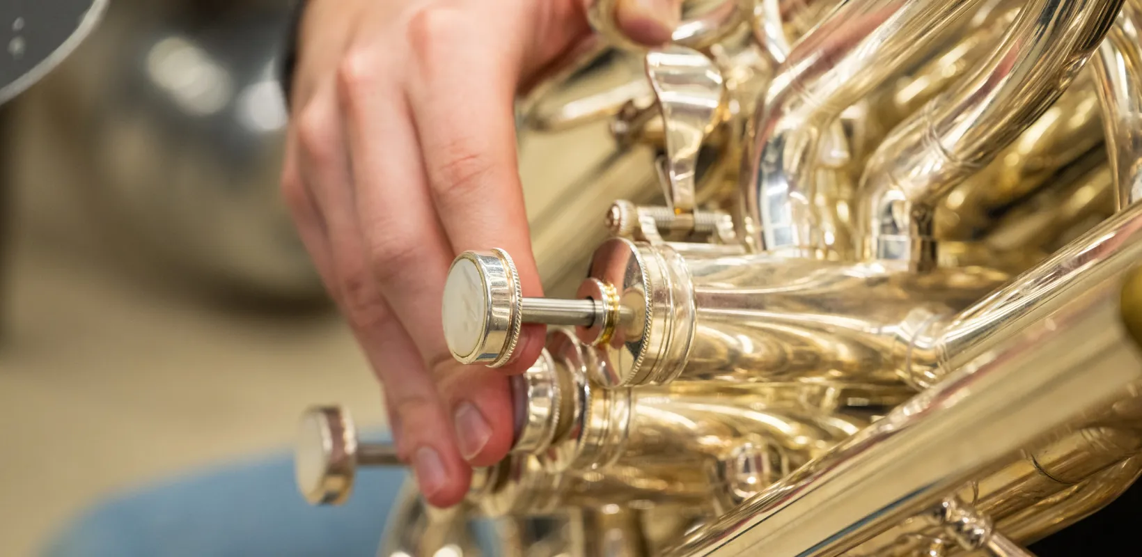 student playing a brass instrument