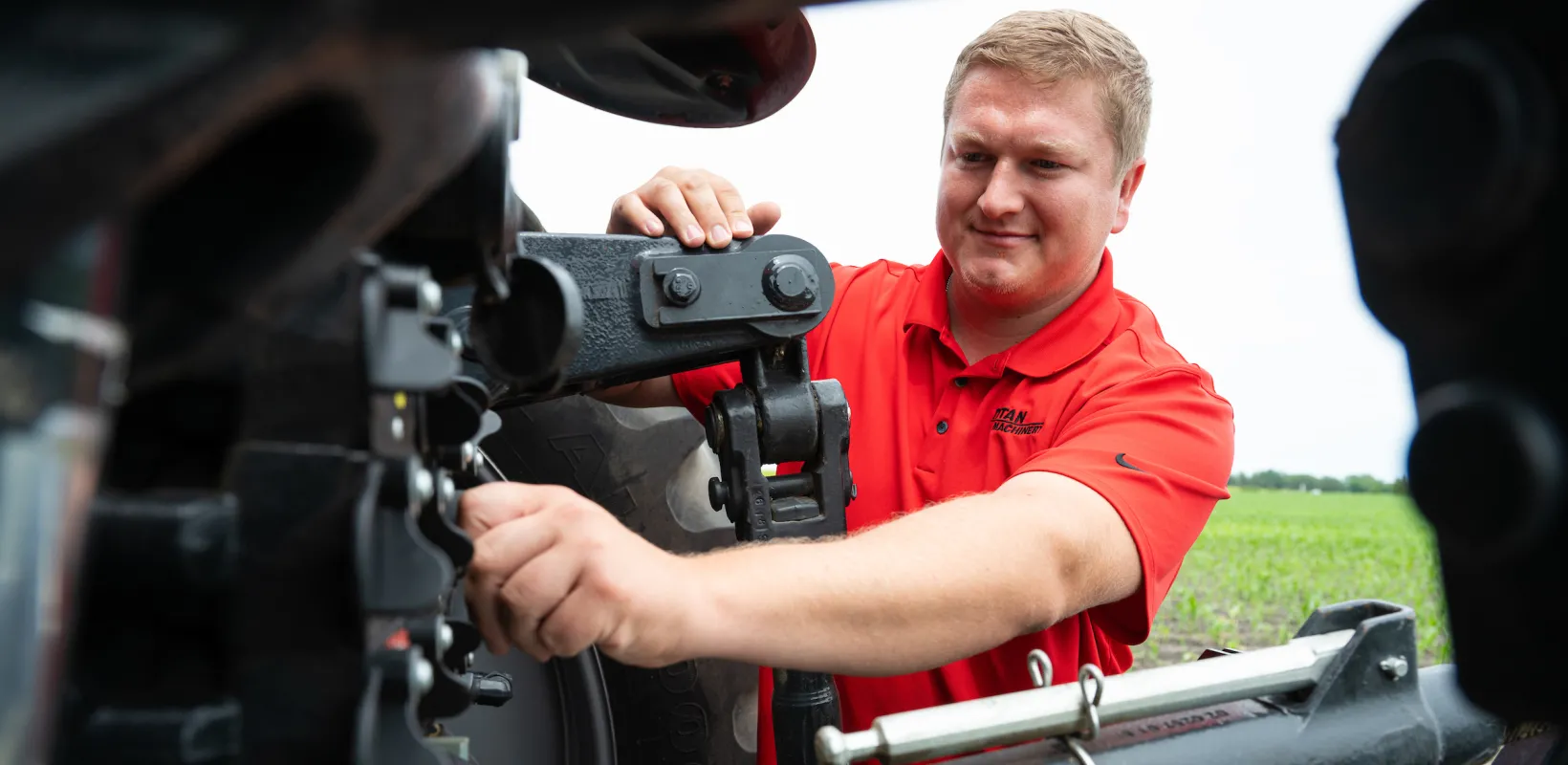 student working on a piece of machinery
