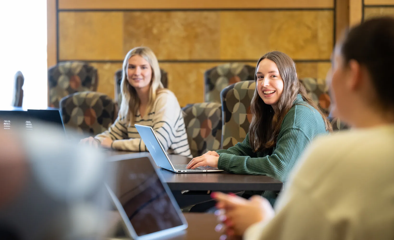 students having a discussion during class