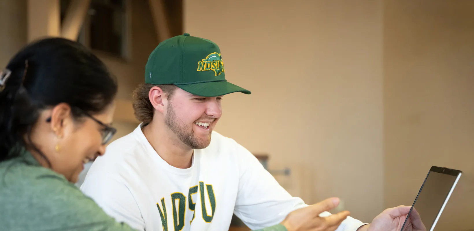 professor helping a student with a project