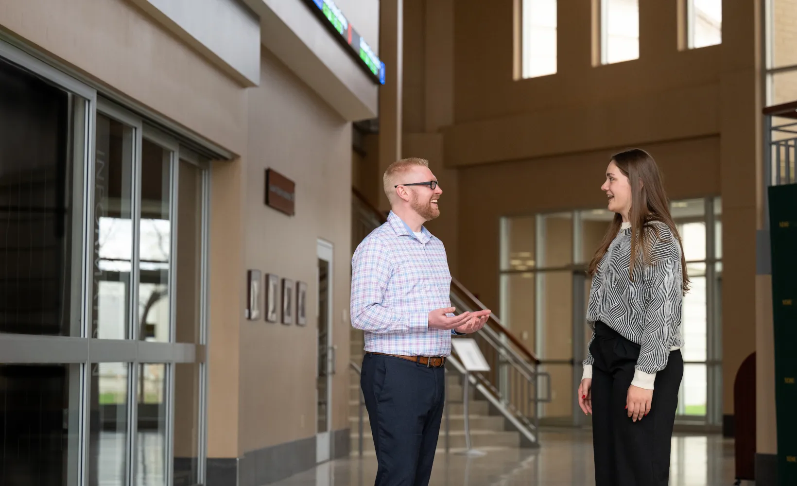 College of Business advisor speaking to a student