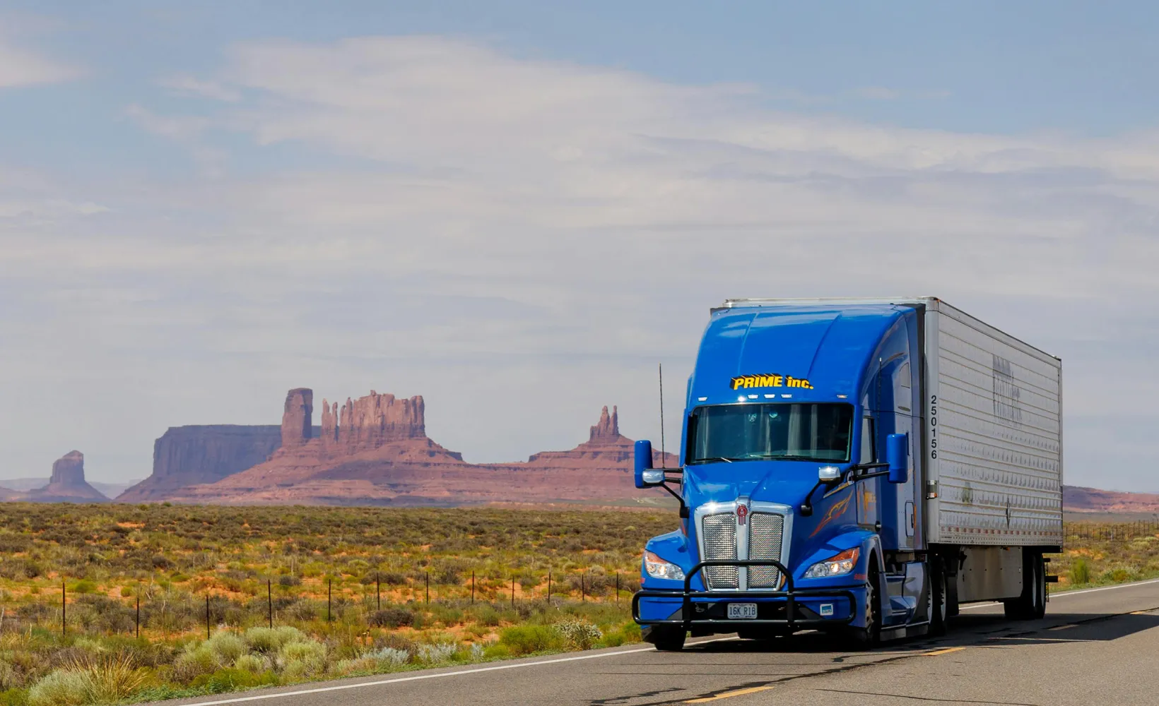 semi truck driving down the highway