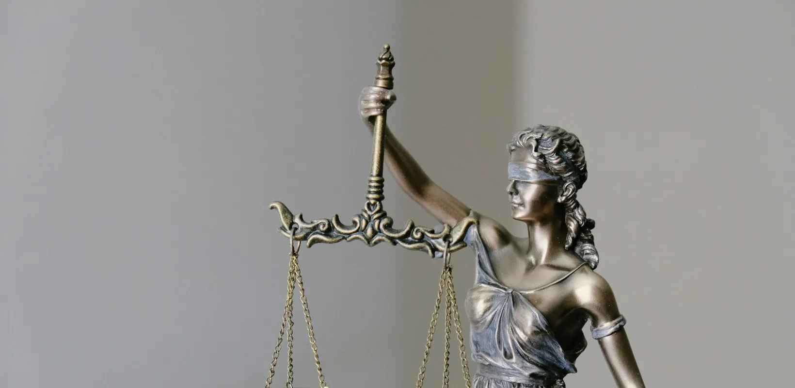 statue of lady justice with her scales