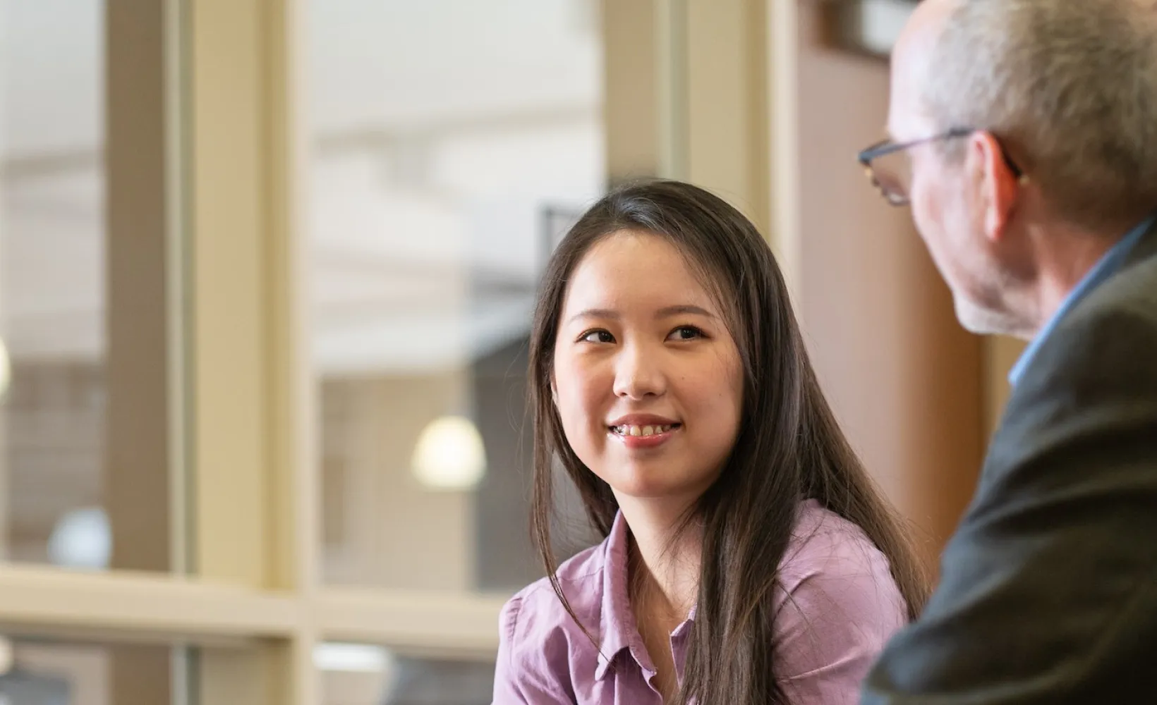 student talking to mentor