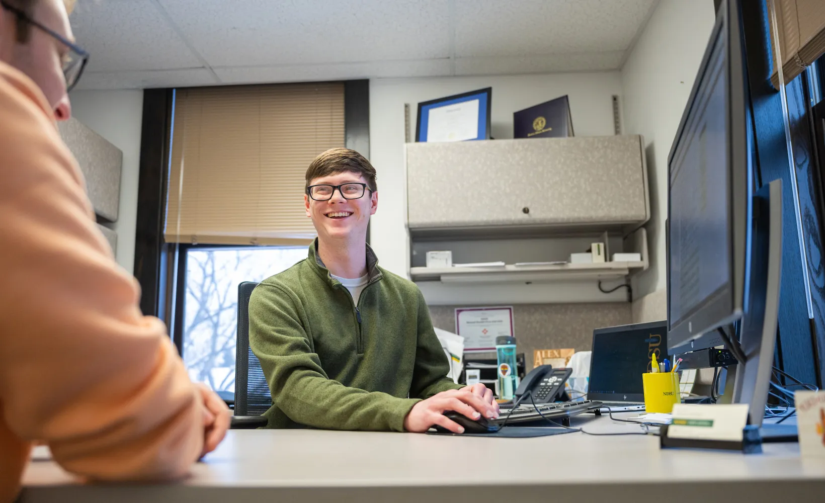 student talking with an advisor
