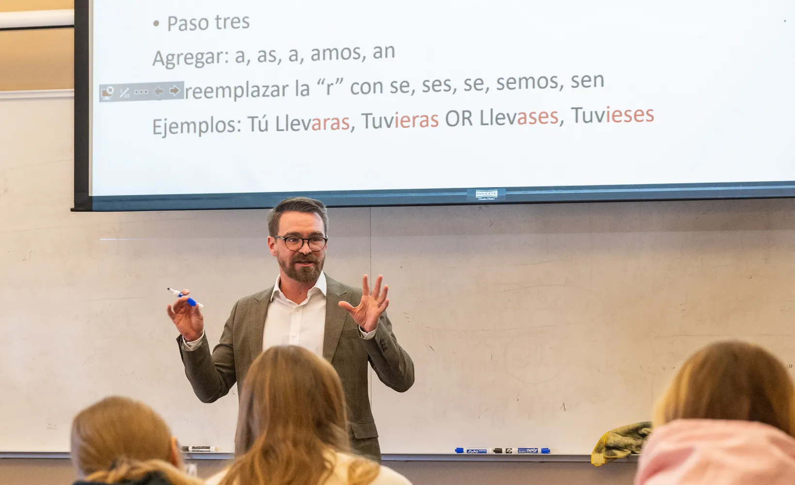 Spanish faculty giving a class lecture