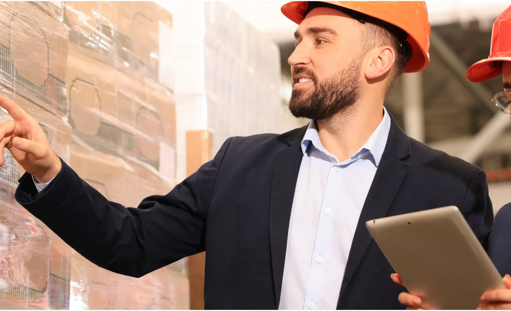 supply chain professionals managing warehouse inventory