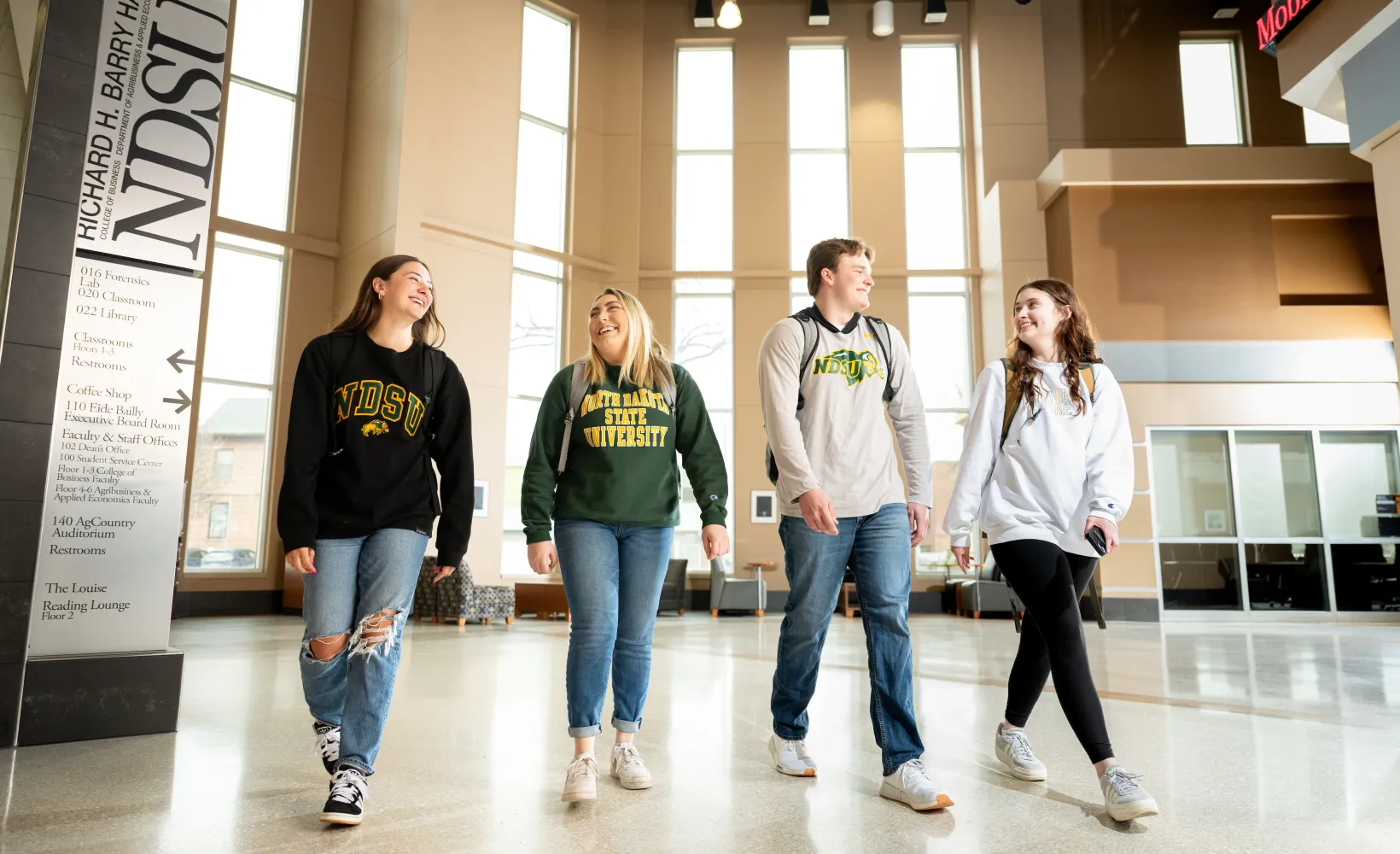 Students walking inside Barry Hall.