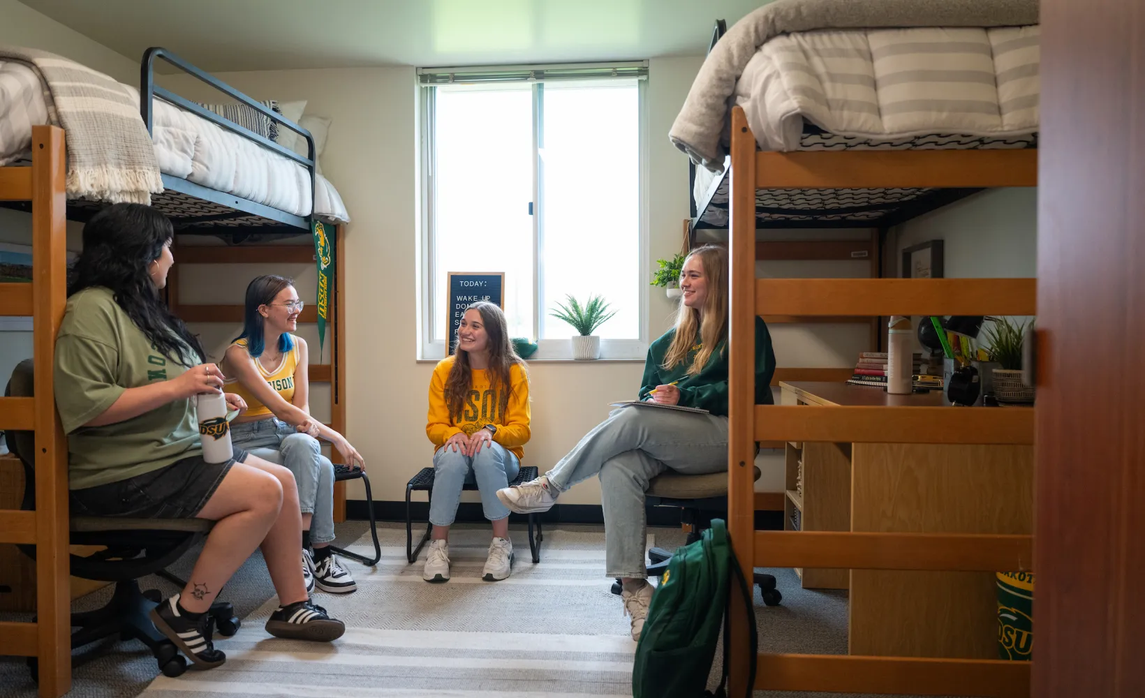 students gathered in a Pavek Hall room