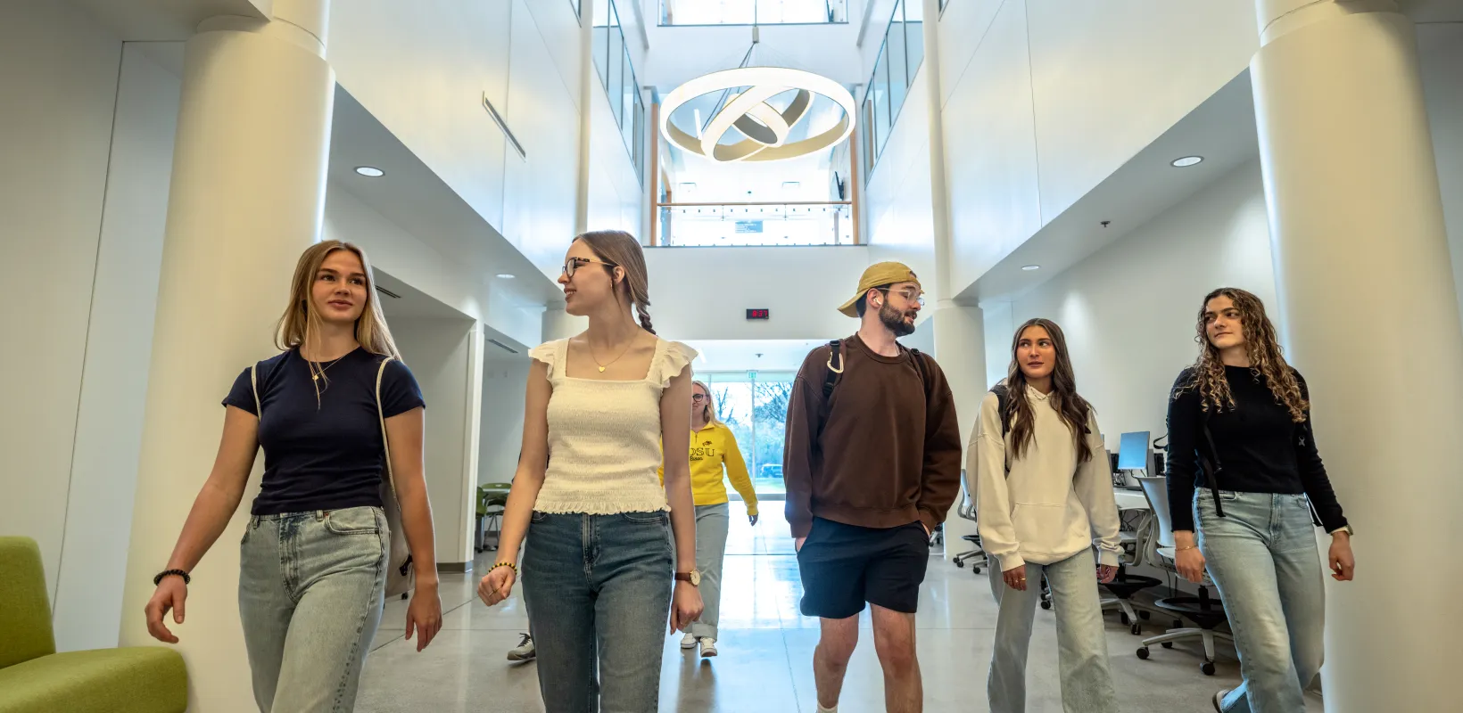 Students walking in STEM building