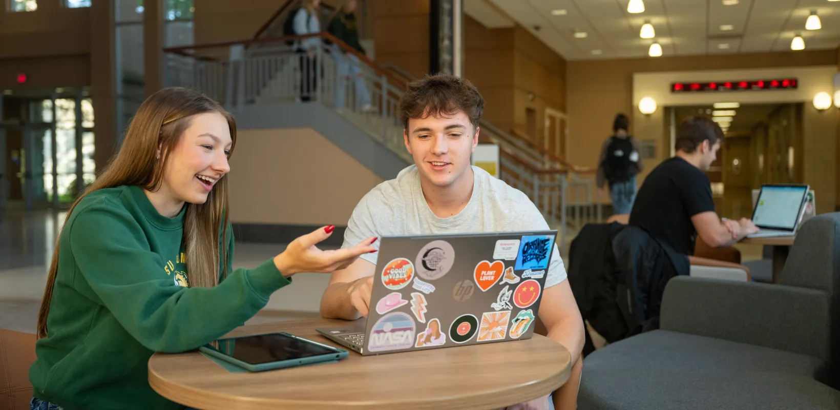 Two students studying in Barry Hall