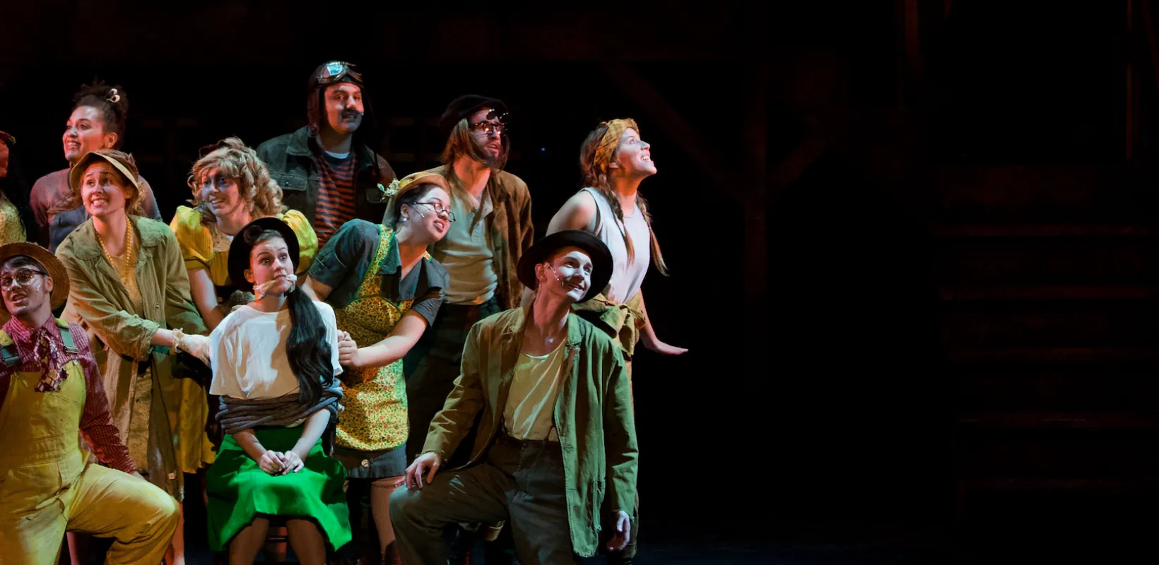 A group of students performing in Theatre NDSU's "Urinetown" in 2017.