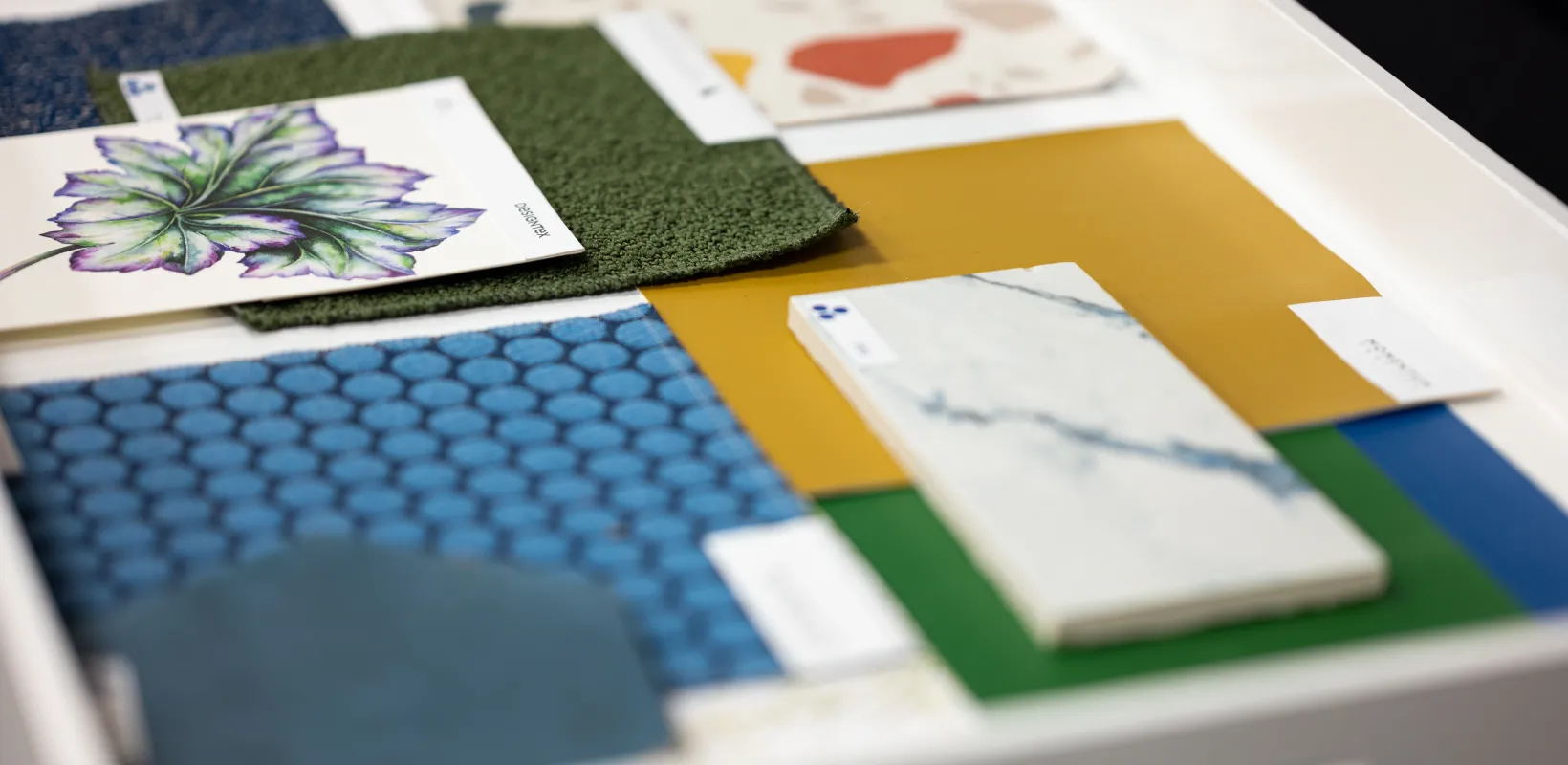 A selection of design elements: fabric, tile, colors and textures.