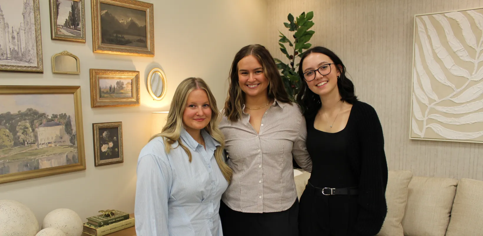 Design students posing in the Scheels Design Challenge Everything Natural room.