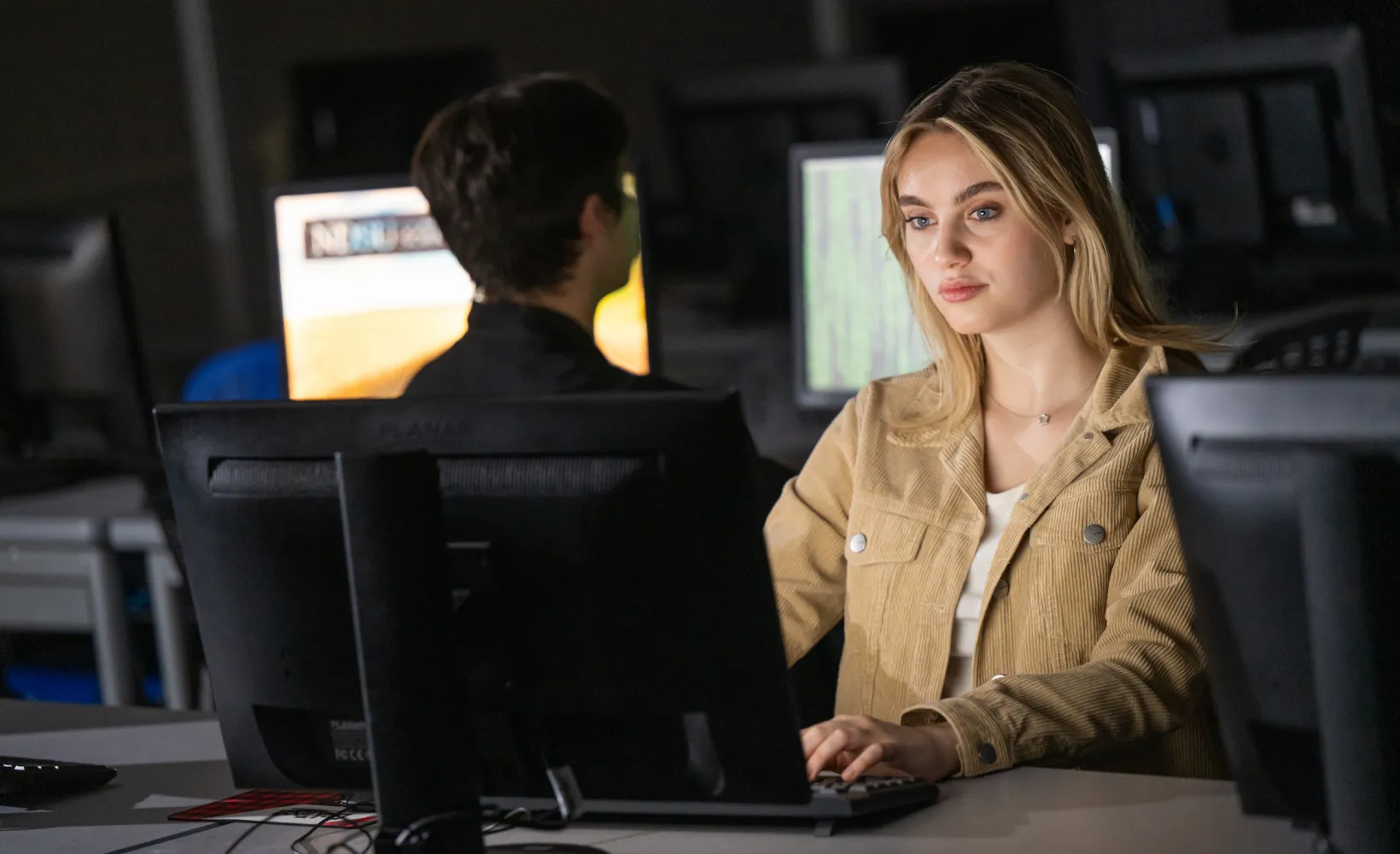 female student at computer in a computer lab