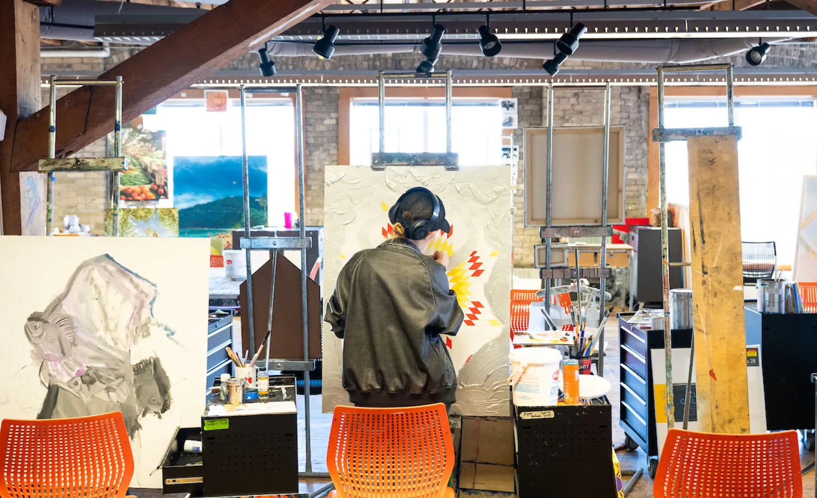 Art student working on project in art studio.