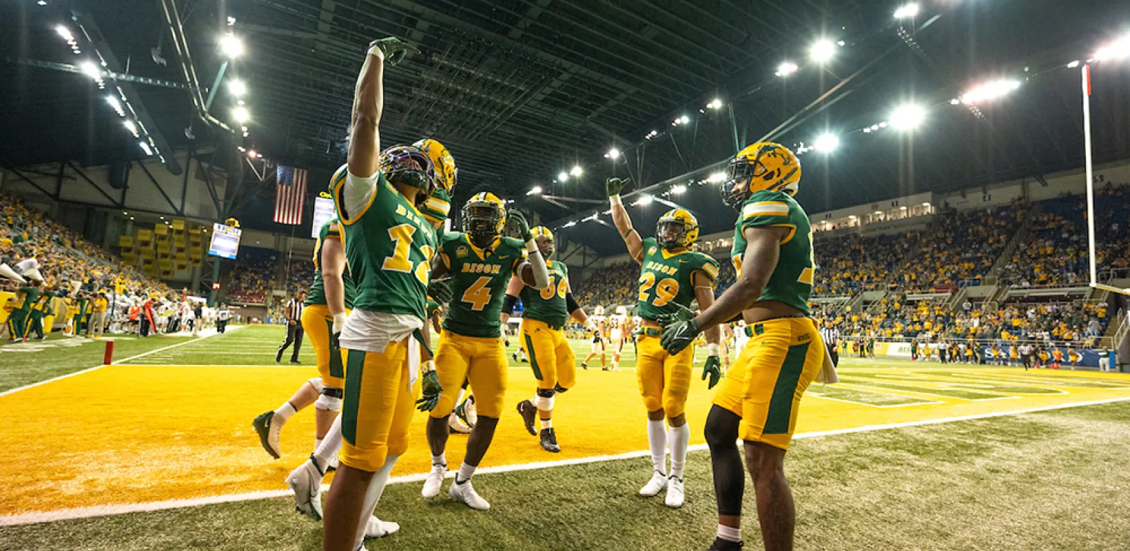 NDSU football players celebrating during a game
