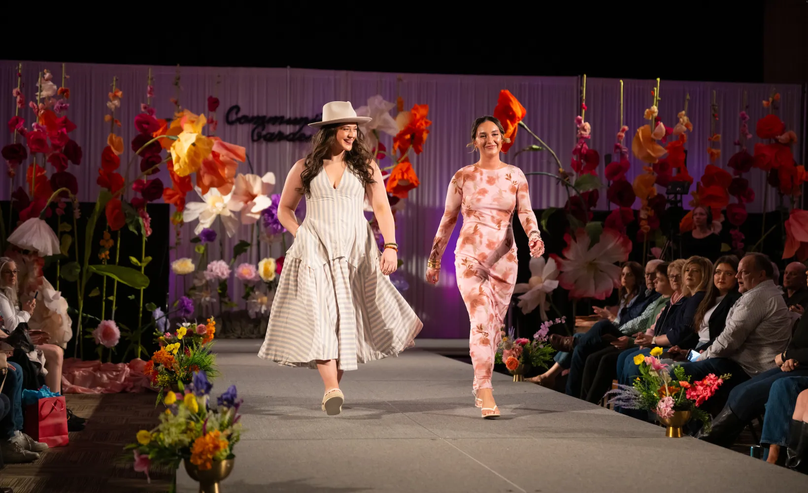 Students walking on stage during NDSU fashion show.