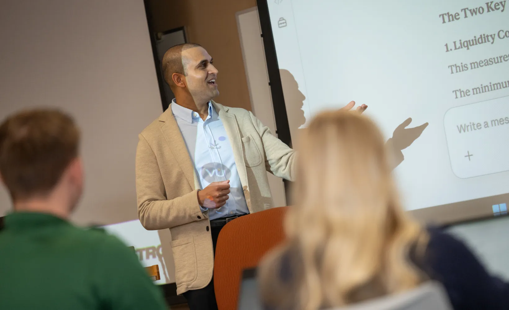 faculty member in Management Information Systems teaches class