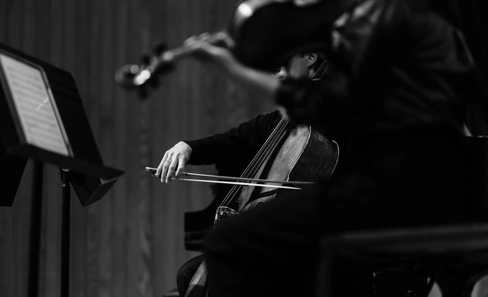 Two string players performing for Chamber Music Festival at NDSU.