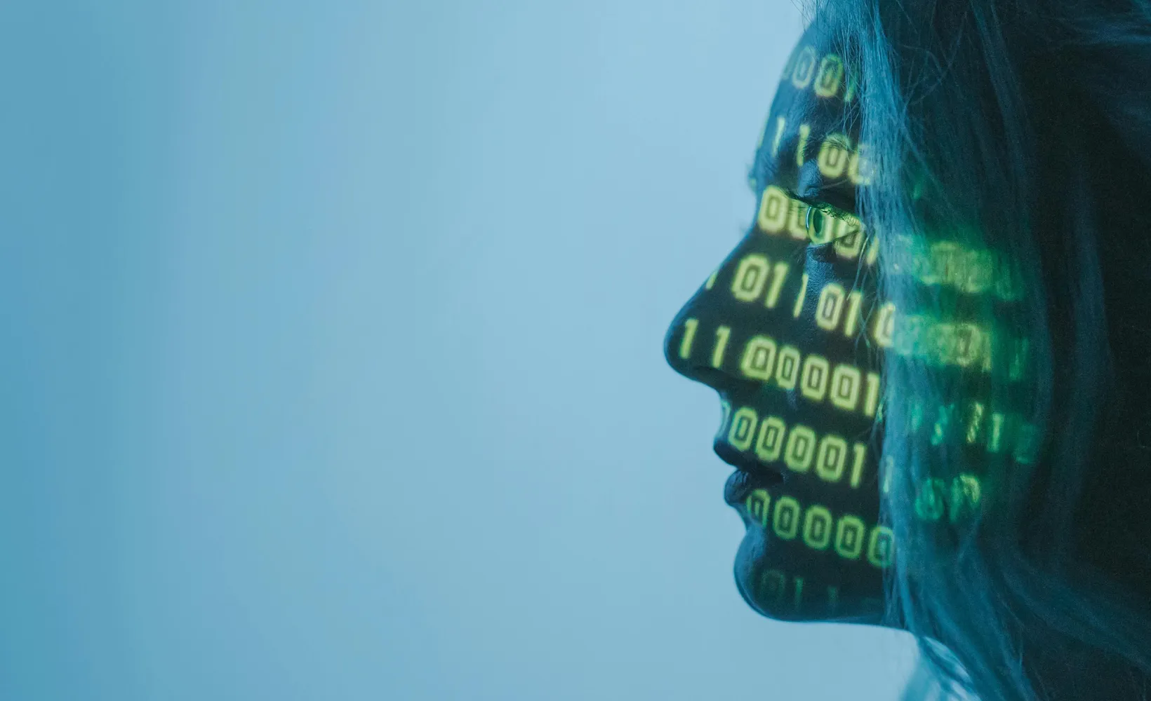 close up of face with code numbers projected on it