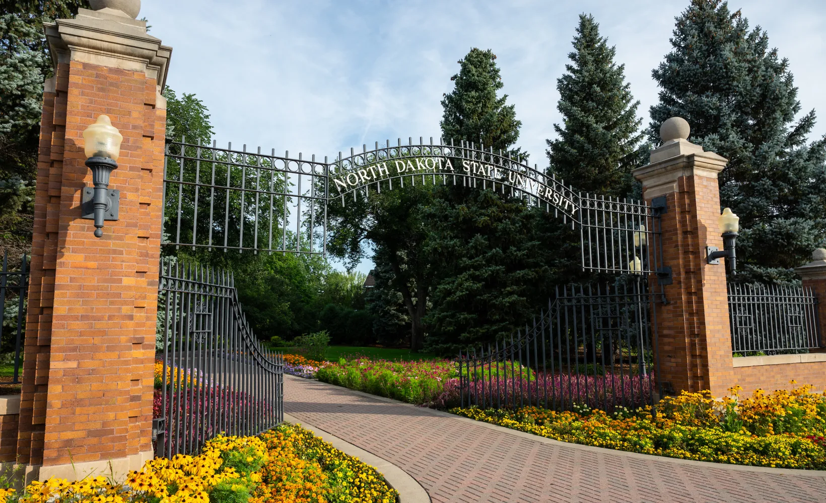 Brick columns and an iron gate