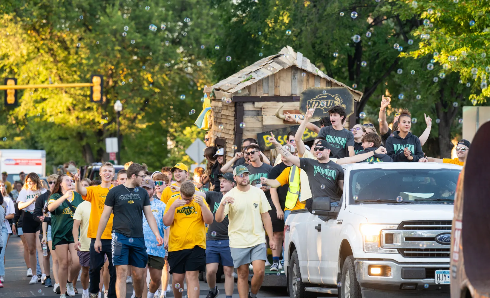 A group of people walk in a parade
