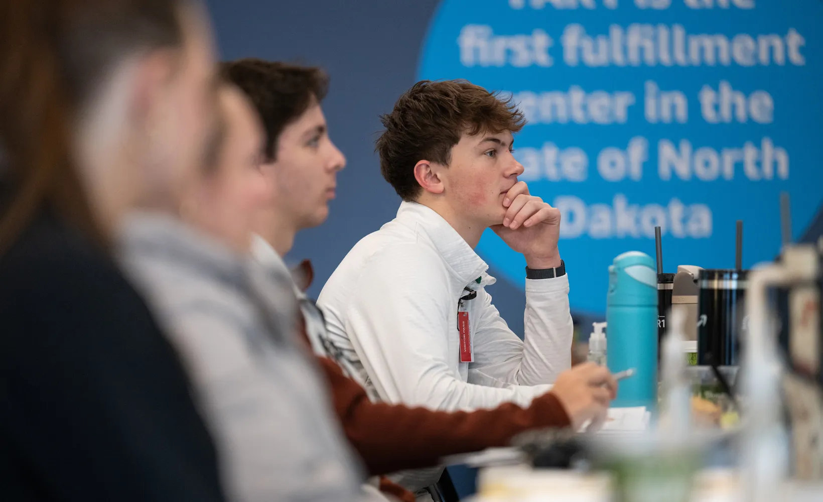 business students listening to community professionals