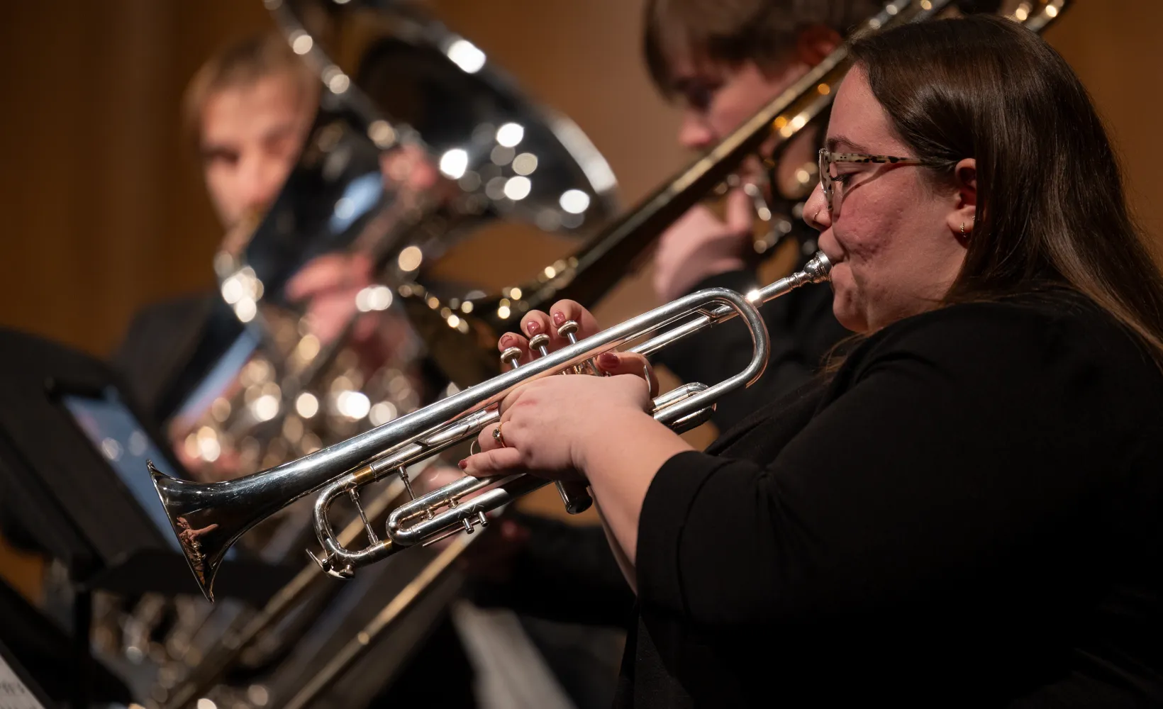 An NDSU music student playing trumpet in the Wind Symphony