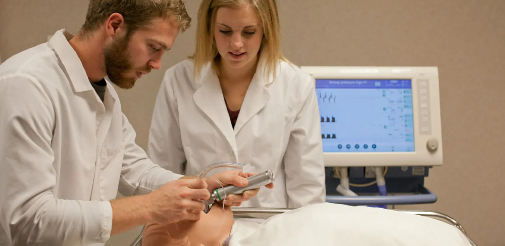 Student working on trach