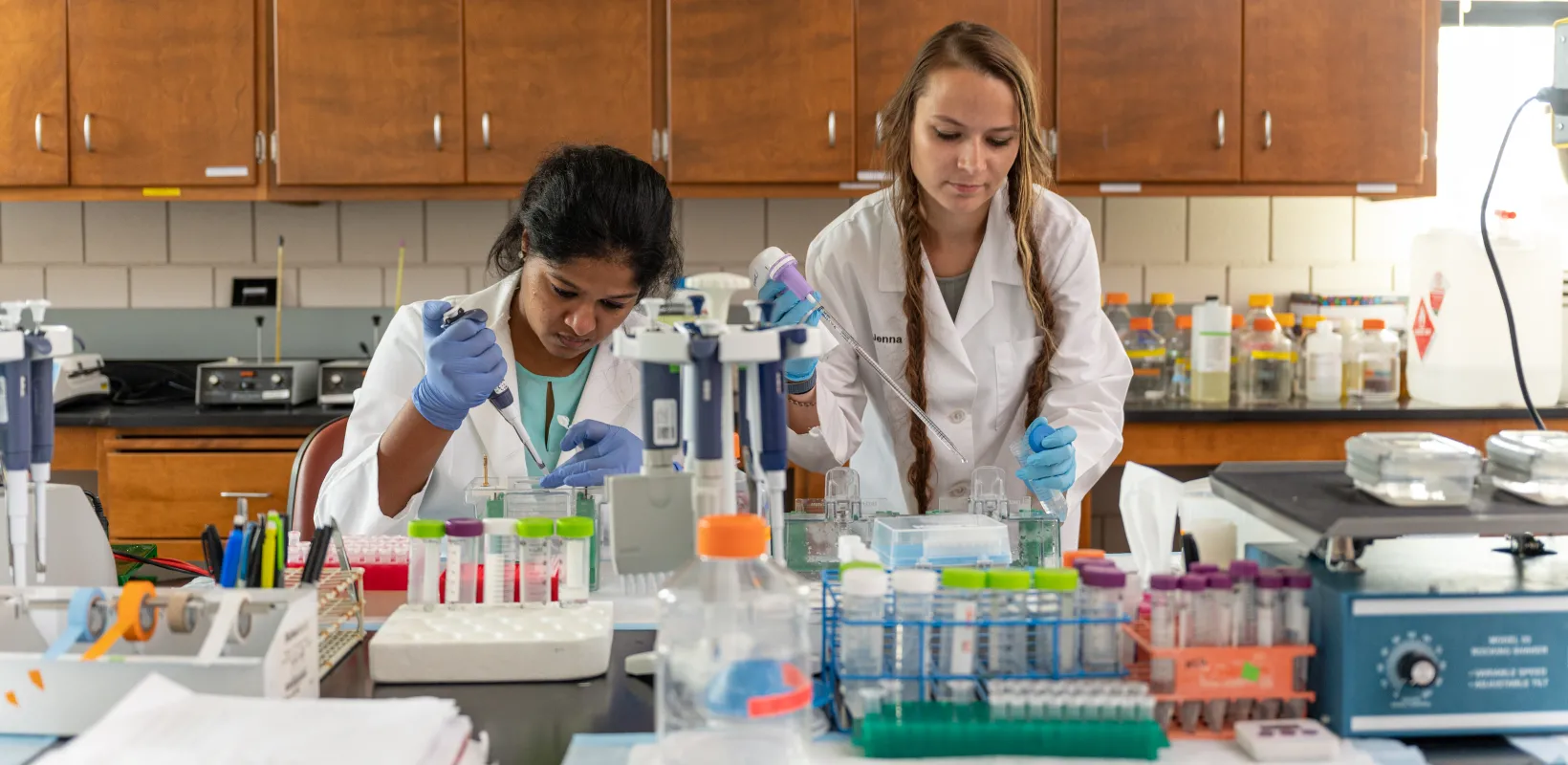 Student performing an experiment in lab