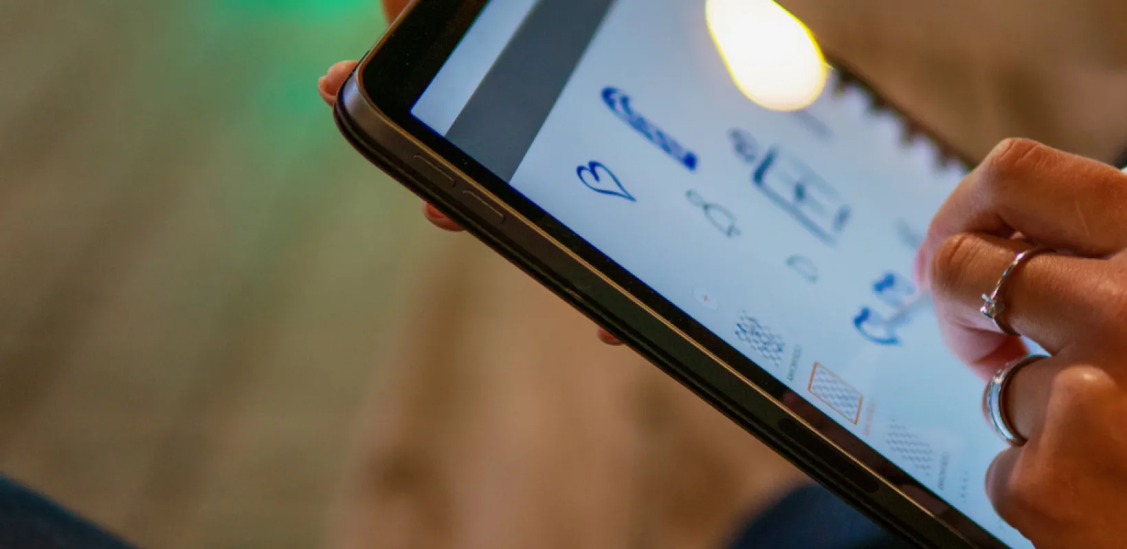 Person Designing on an IPAD