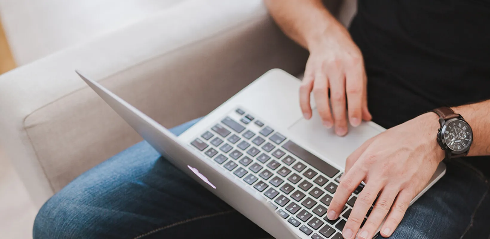 Man using computer to search for courses